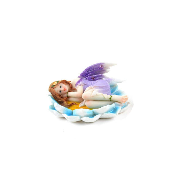 Fairy in Purple Resting on a Flower