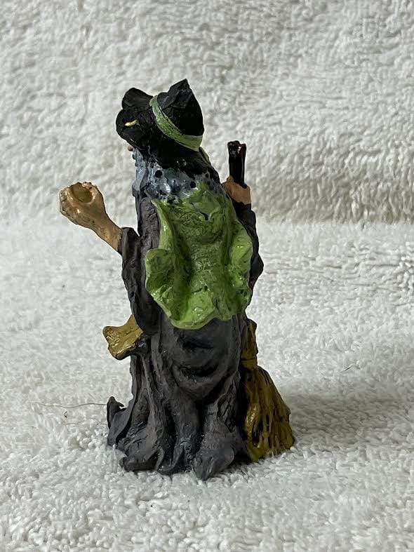Halloween Witch Figurine in Gray with a Golden Ball