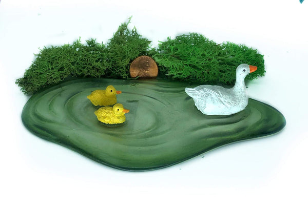 Miniature Ducks, Mama Duck and Ducklings on a Pond, Spring Duck Family